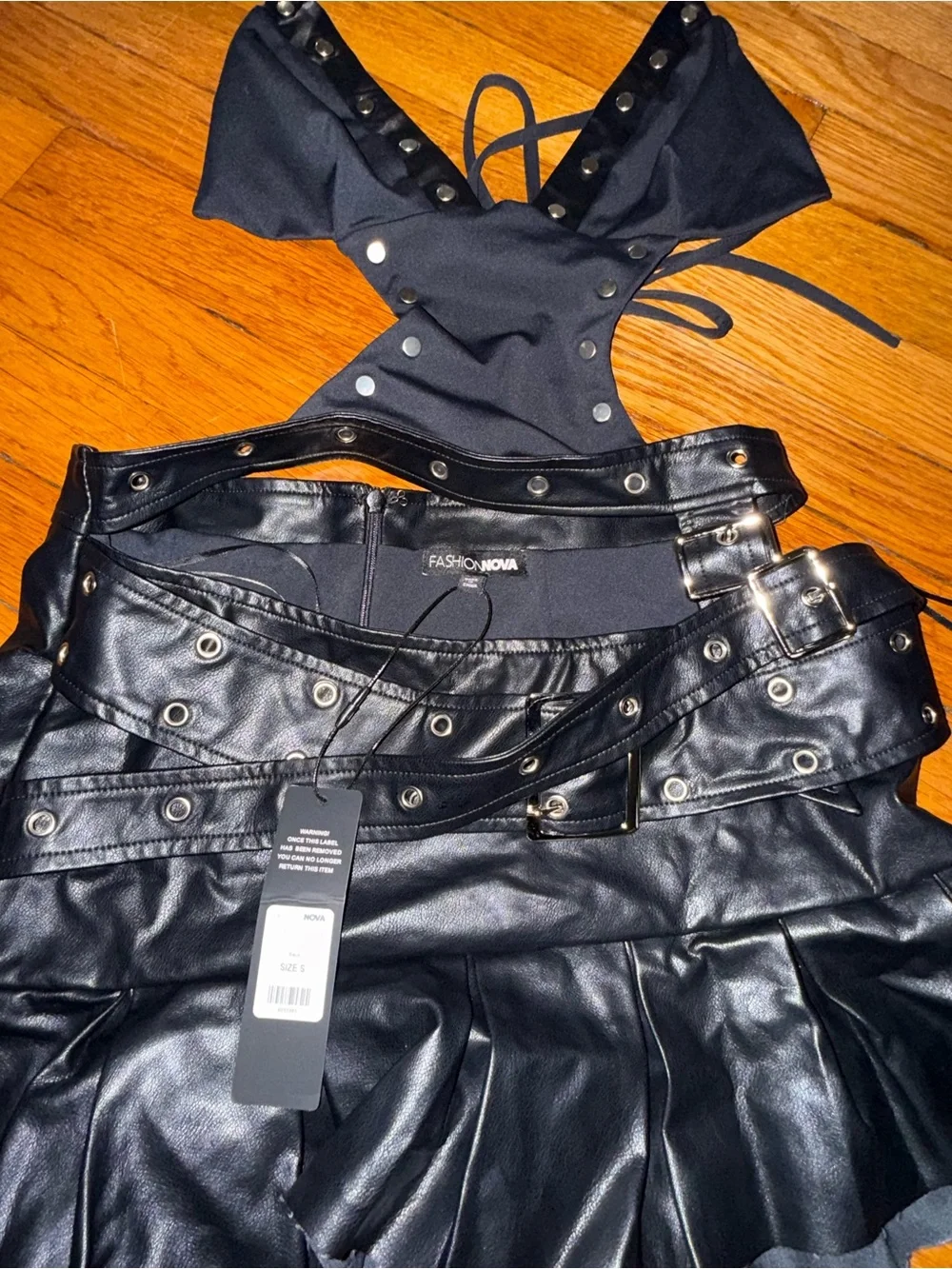 Fashion Nova Black Faux Leather Pleated Mini Skirt one piece with Grommet Detail